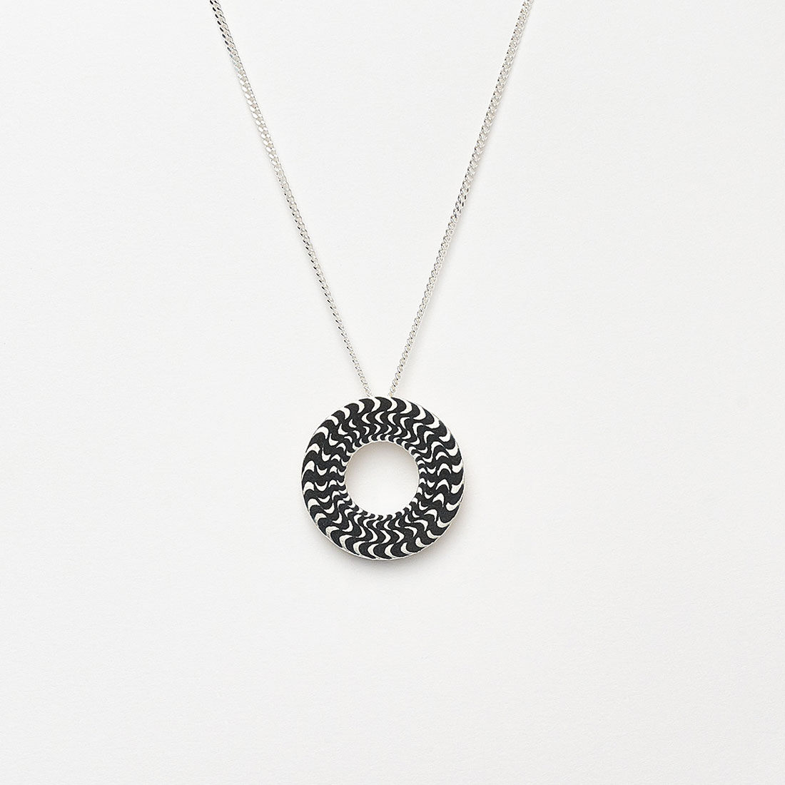 ‘Finesse’ Silver and Black Circular Pendant